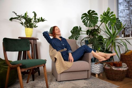 full shot woman restoring furniture
